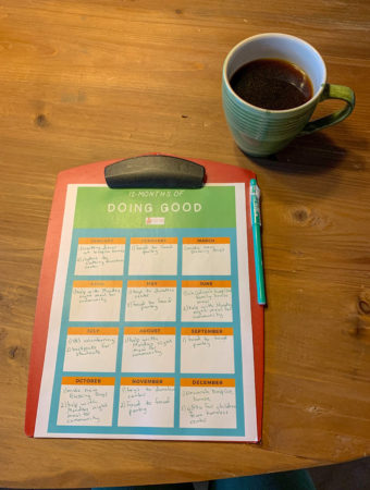 12 month planner for do good ideas with coffee cup on table