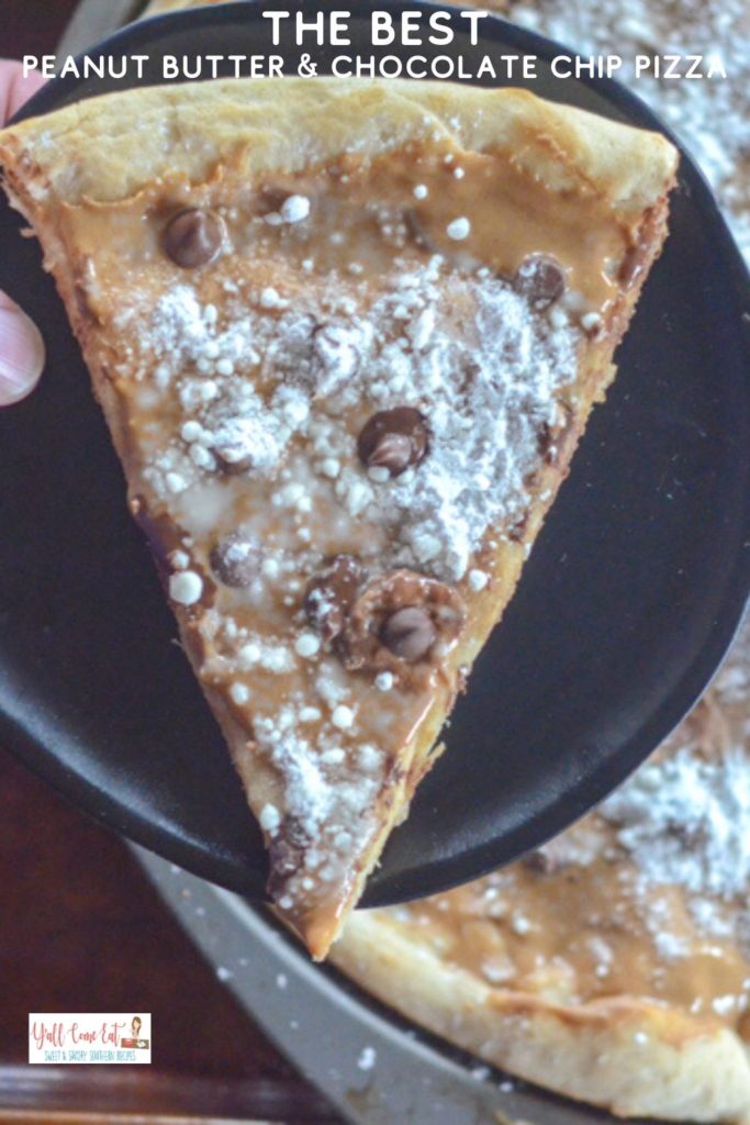 peanut butter chocolate chip pizza on black dessert plate 