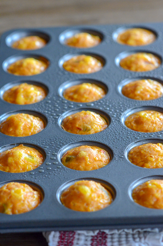 baked egg cups in mini muffin tin on table 