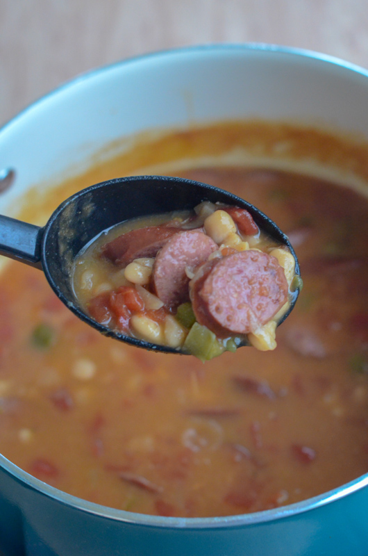 blue pot of white beans and sausage soup 