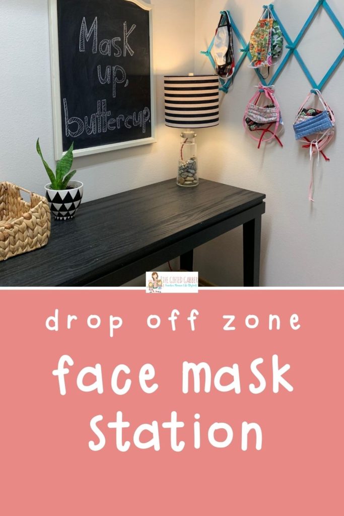 drop off zone mask station in mud room with chalkboard and accordian hook display for masks