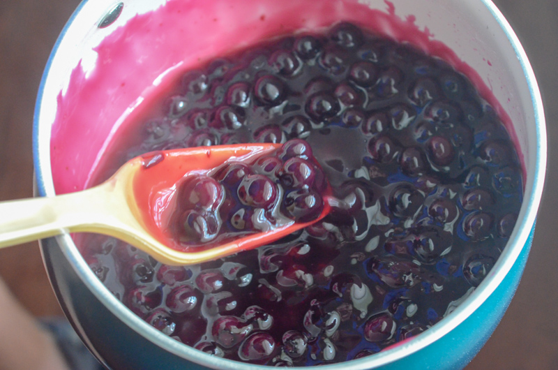 blue saucepan with homemade blueberry filling for pies 