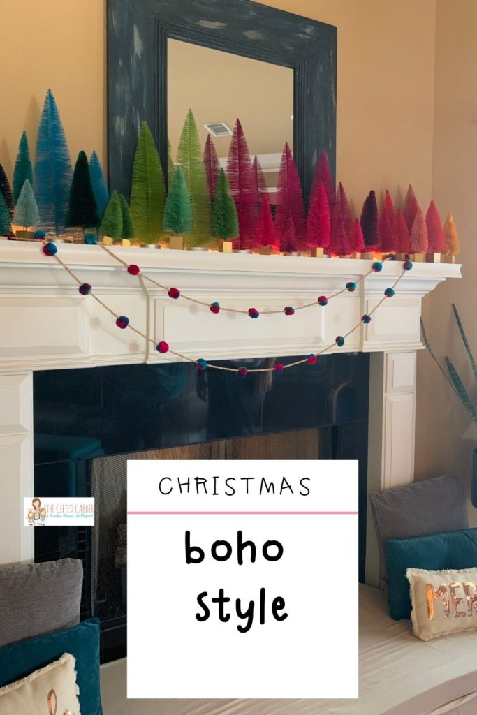 bottle brush trees Christmas mantle decor on white mantle for boho Christmas decor with text overlay