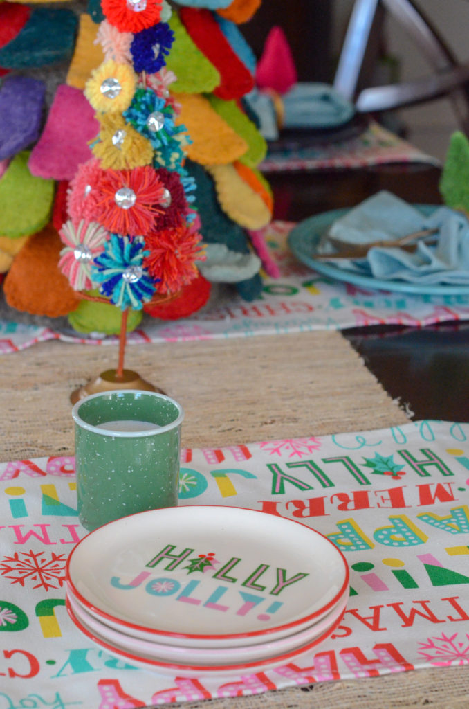 holly jolly appetizer plates and table runner on boho Christmas table