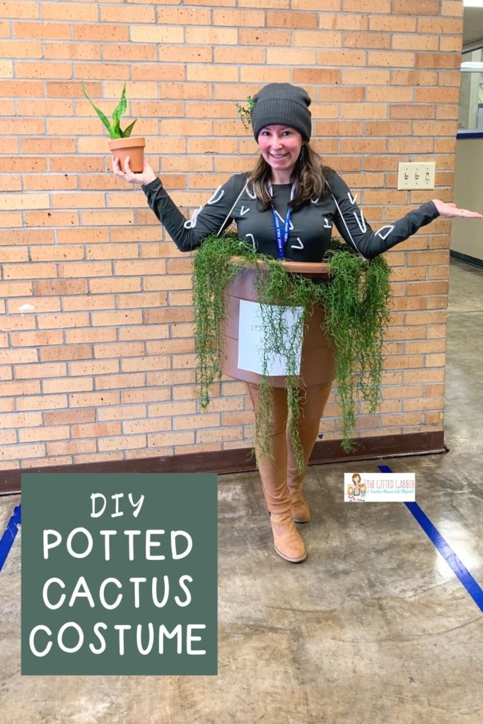 teacher stands in school wearing a cactus Halloween costume DIY for a teacher costume  for Earth Day