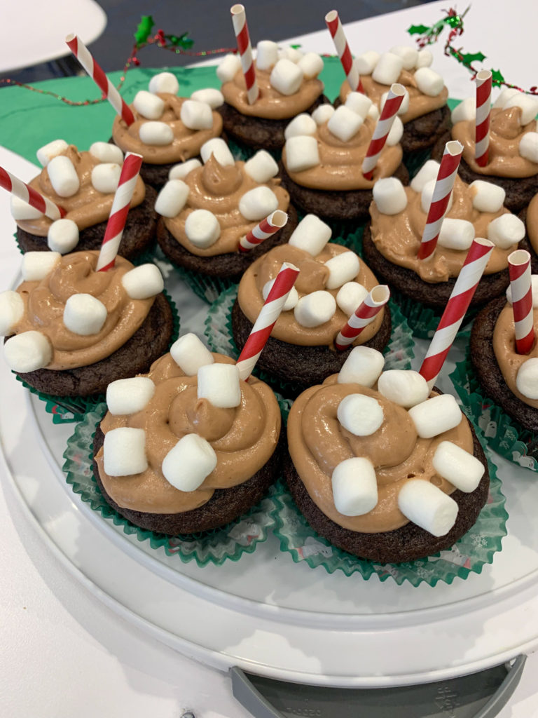 hot cocoa cupcakes in staff Christmas bake off