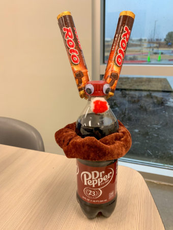 Rudolph Christmas drink gift on office table