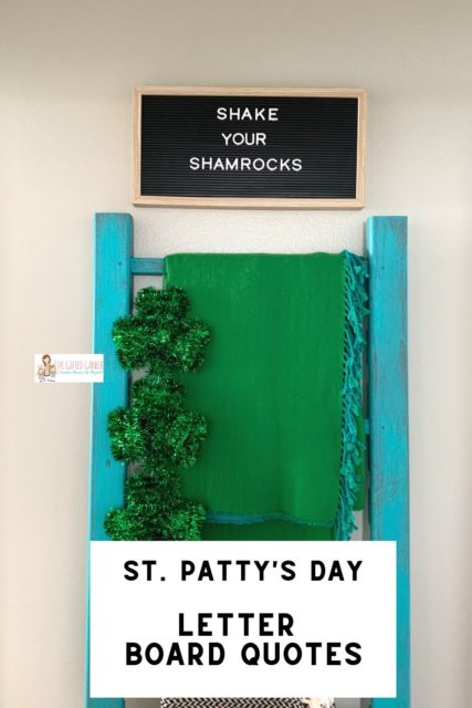St. Patrick's Day sayings on black letter board above a blue blanket ladder with a green blanket and Shamrocks decor