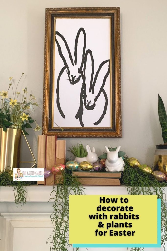 bunny wall decor on spring Easter mantle with succulents and bunnies