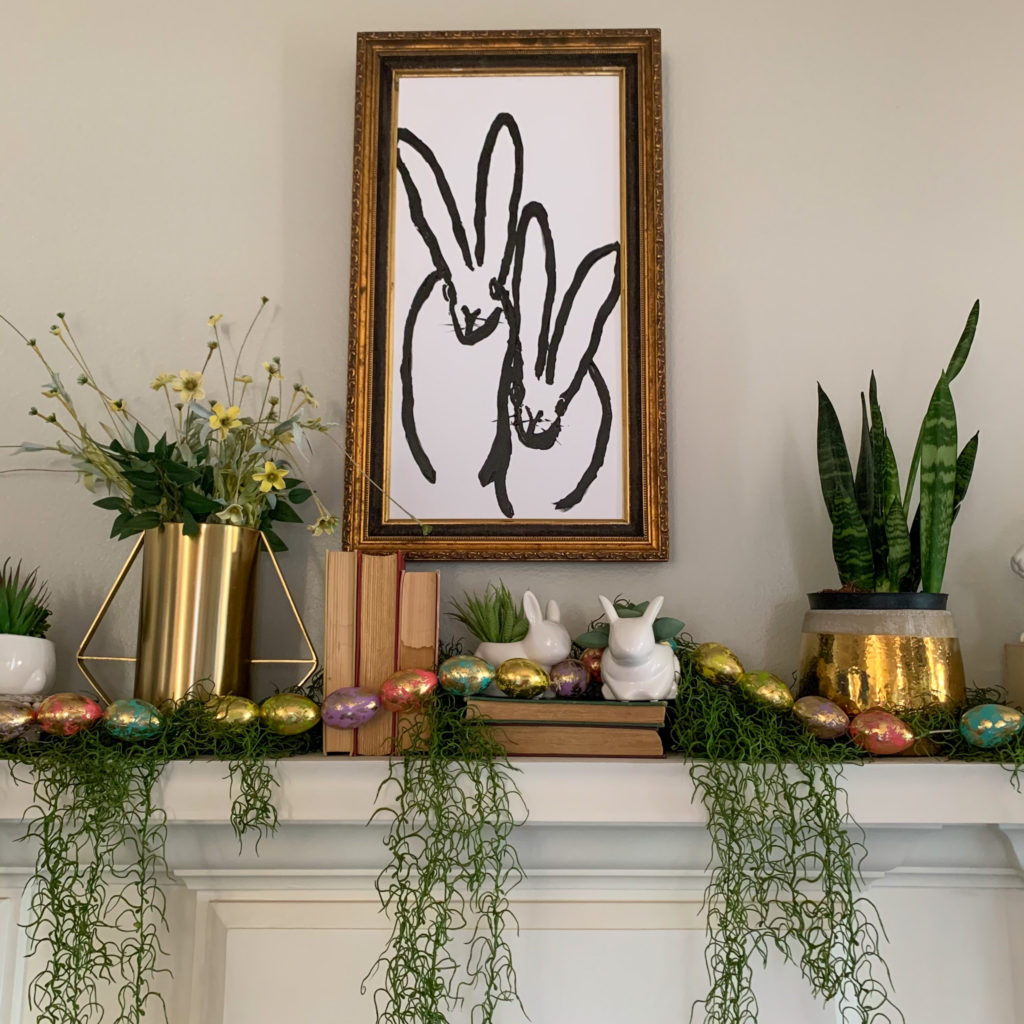 rabbit decor on mantle with custom bunny art in vintage gold frame