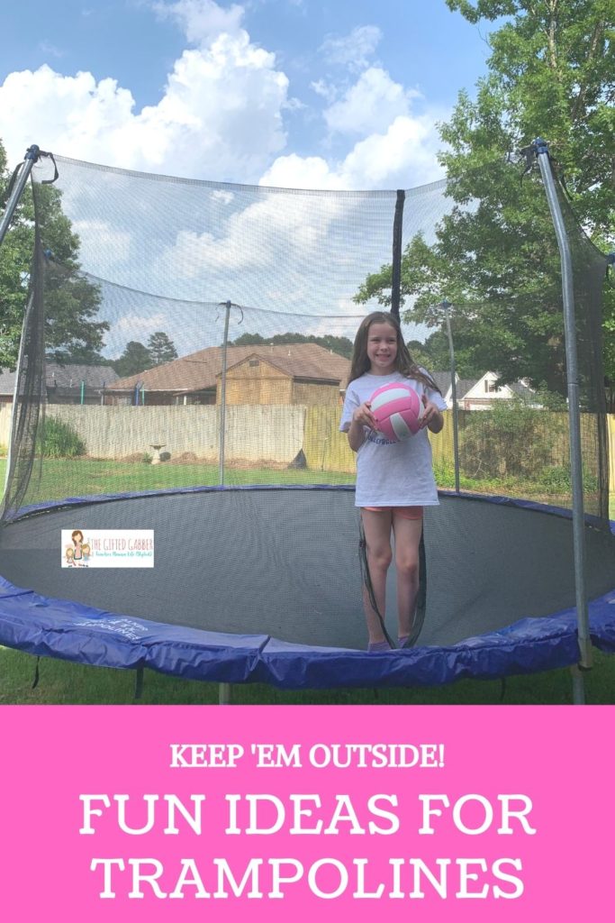 girl having trampoline fun with fun trampoline games on a 17x10 oval trampoline with blue safety pads