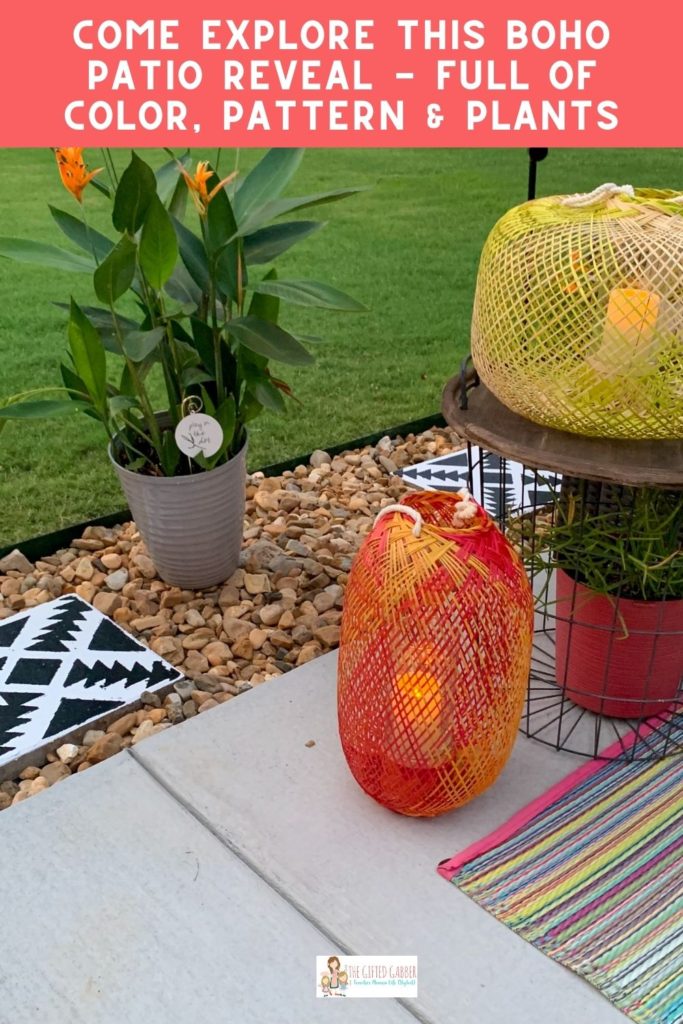 outdoor tropical patio plants with bamboo lanterns in hot pink, orange and yellow. 
