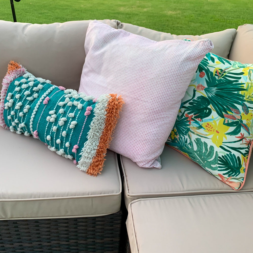 modern boho patio pillows on outdoor wicker sectional 