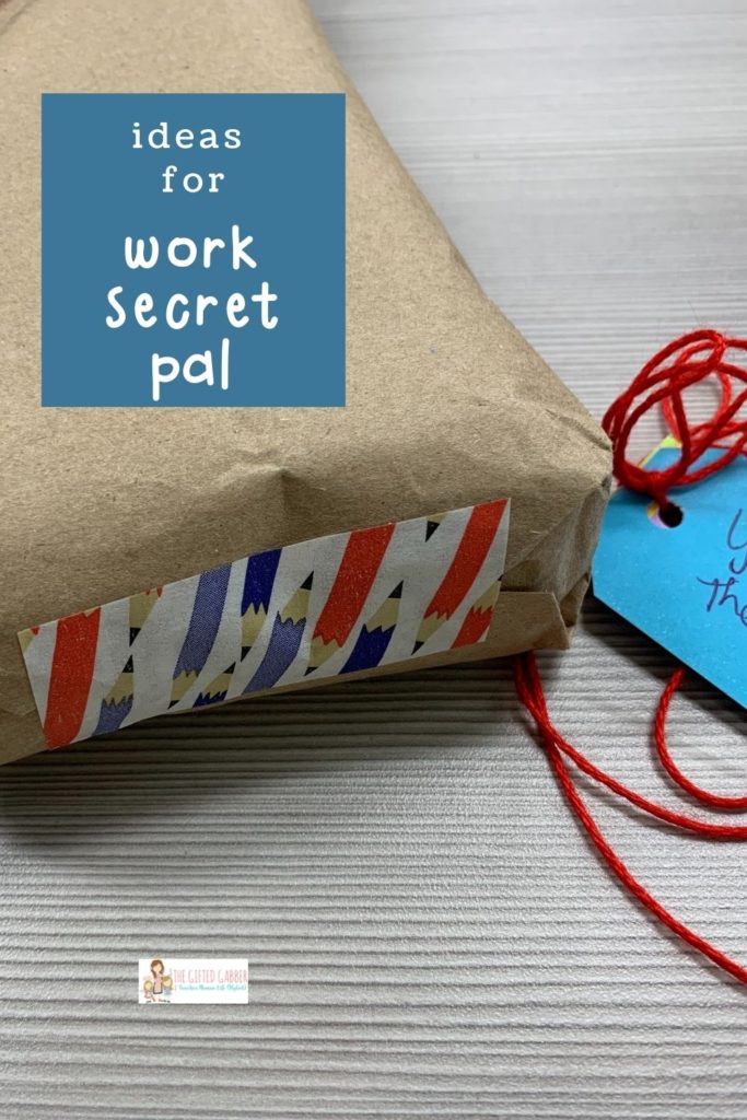 secret pal gift for teacher on teacher's desk with pencil themed tape and ribbon
