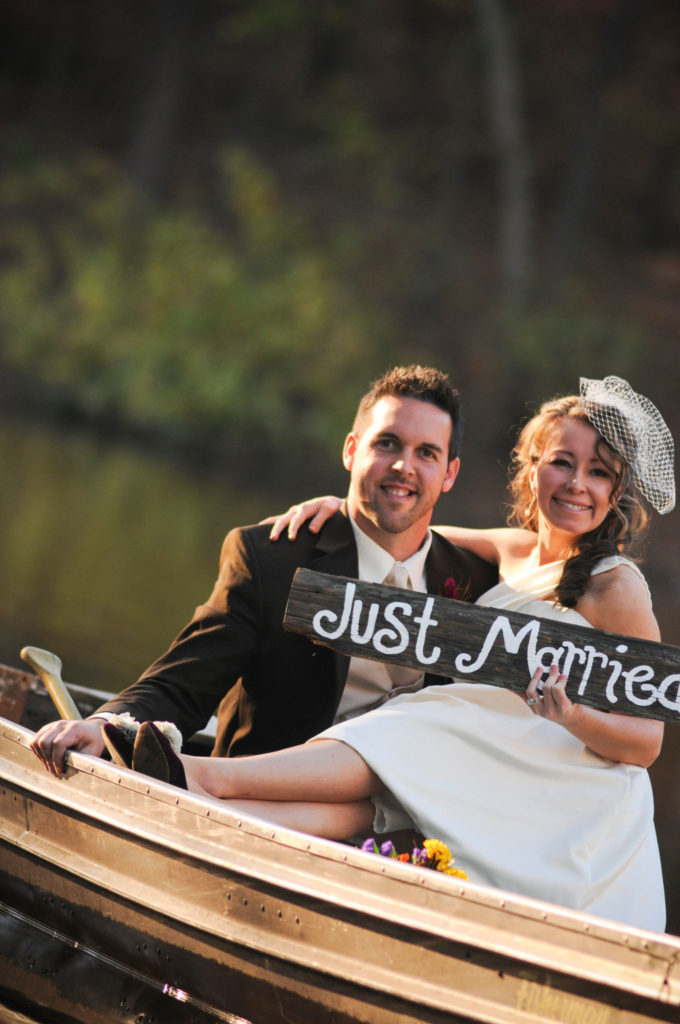 Little Rock blogger, Amy, riding in a wedding canoe with the groom at Alda's Magnolia Hill - a favorite of the Little Rock Arkansas wedding venues