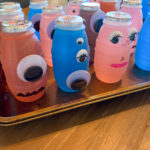 tray of Halloween juice boxes on a wooden table