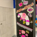 a classroom door decorated for door decorating contest for Breast Cancer Awareness Month