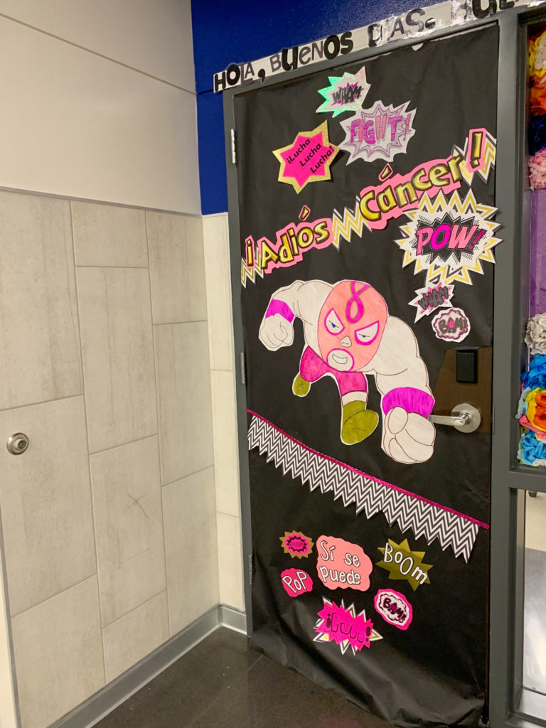 a Spanish classroom door decorated for Hispanic Heritage Month door contest and Breast Cancer Awareness Month door contest