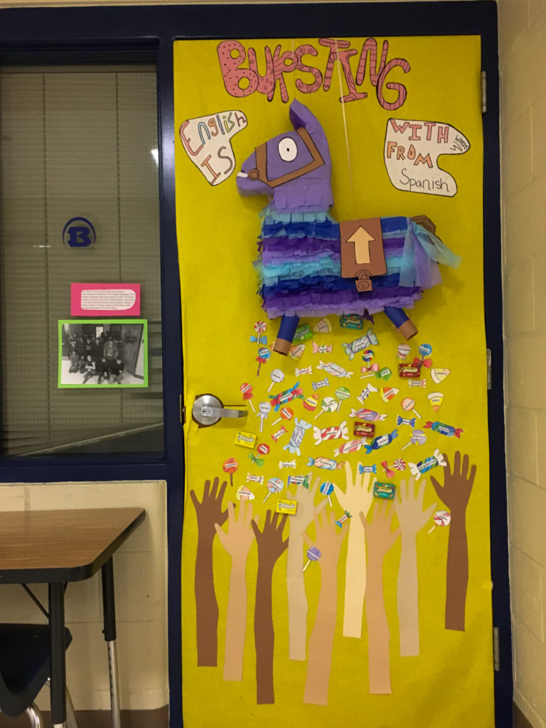 a pinata display on a door for a Hispanic Heritage Month door contest