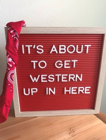 country girls quotes on red letter board with red bandana on side