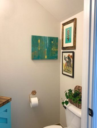 a wall gallery corner in a 2 piece bathroom