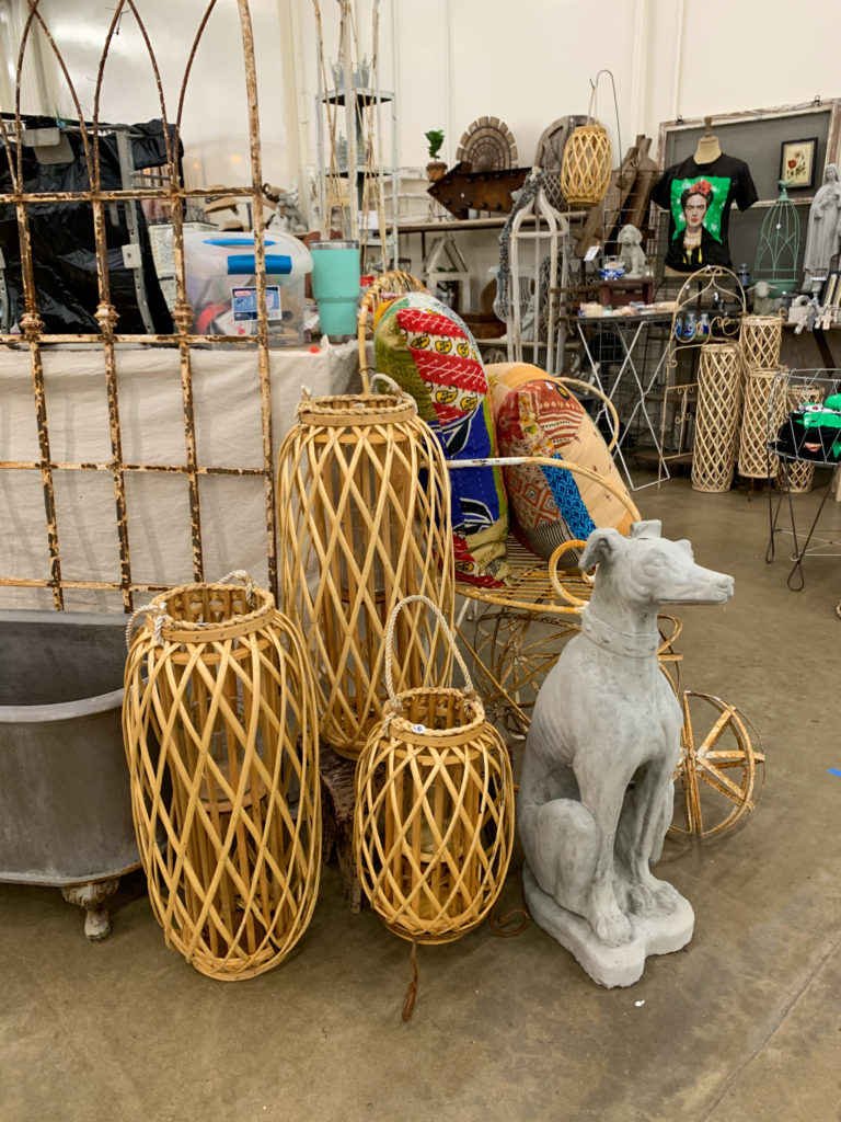 bamboo baskets and a dog statue