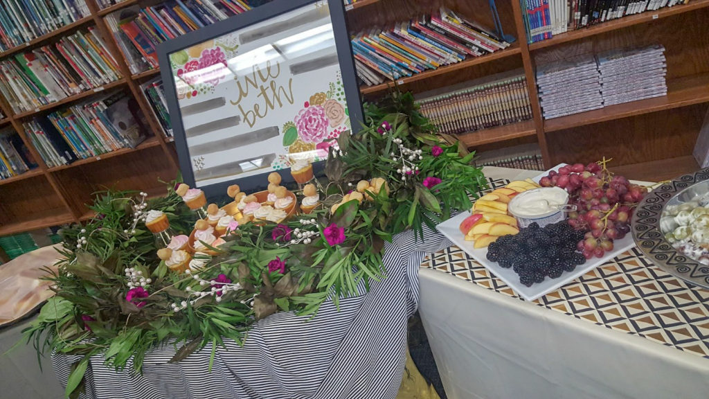food table at a spring baby shower theme for work 