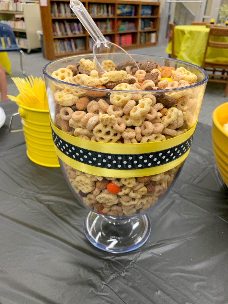 honeycomb cereal mix in glass bowl for honey bee party