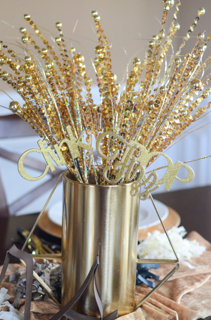 gold vase of NYE picks for baby shower themes for winter 