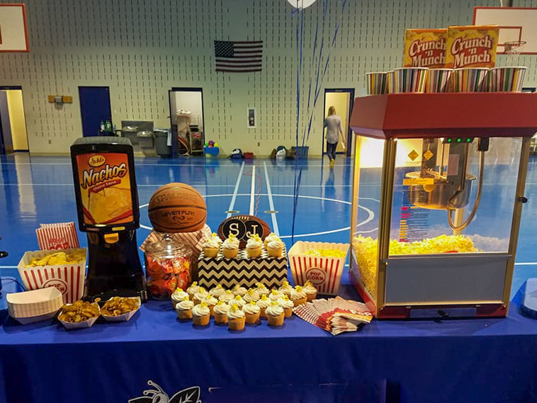 sports theme baby shower set up in gymnasium for church showers or work showers