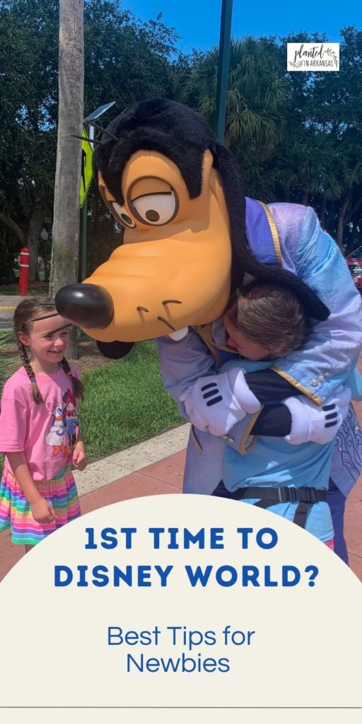 Goofy hugs two girls during their first time at Disney World trip