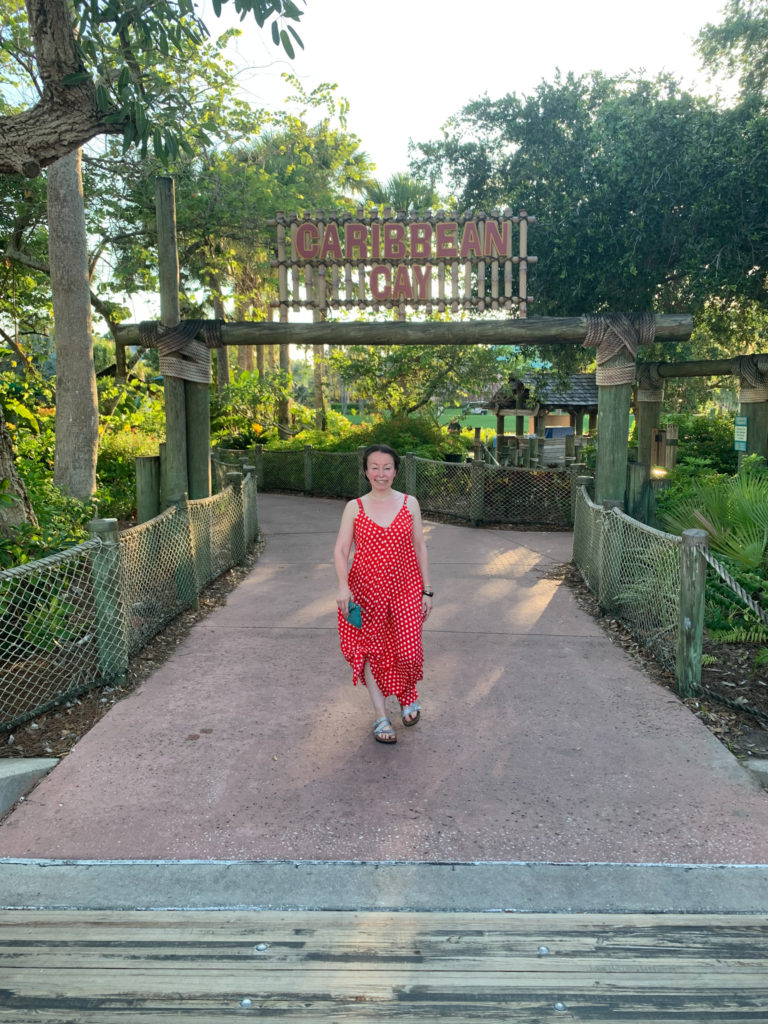 woman walks at Caribbean Cay Island at Disney Caribbean Beach Resort