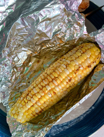 spicy grilled corn on the cob in foil wrap