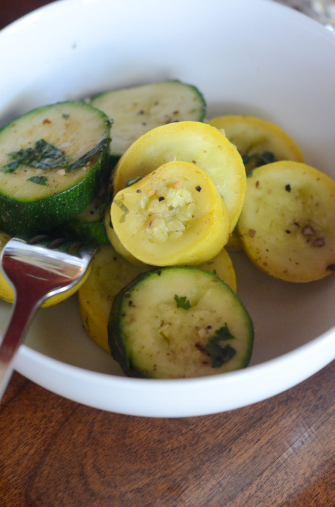 white bowl of grilled zucchini and squash