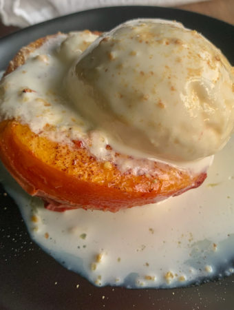 air fried peaches on black plate