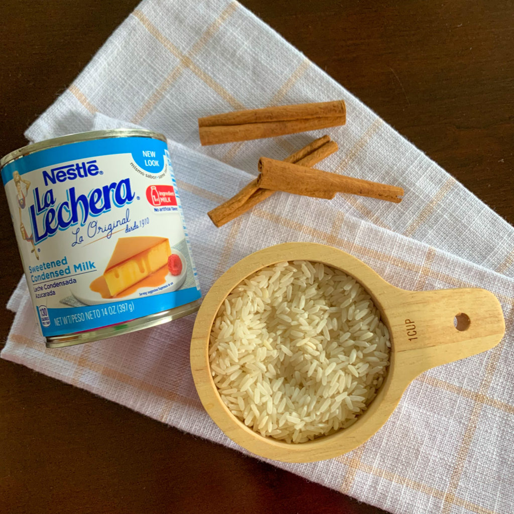 Nestle Lechera and rice in a wooden cup