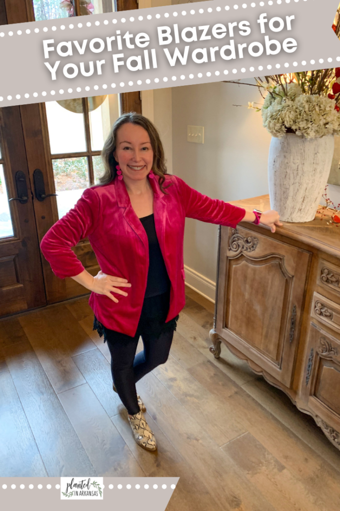 woman poses in blazer outfit with hot pink blazer in velvet