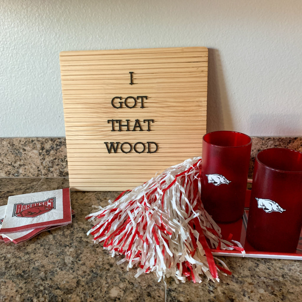 wooden sign with Darren McFadden quote about wood and Hogs party ware