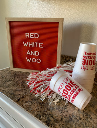 Arkansas sayings for Razorback signs and letter boards on a red letter board with pop pom and cups