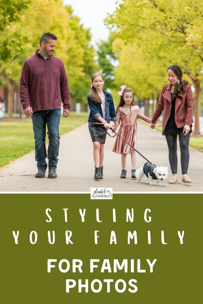family walks dog while wearing dusty pink and black outfits with brown suede biker jacket and text overlay