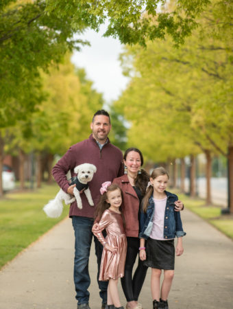 Arkansas lifestyle blogger, Amy, and her family pose in downtown Little Rock