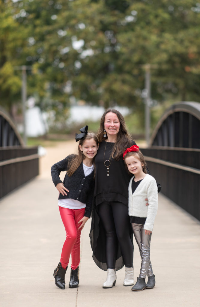 mom and girls pose in faux leather leggings outfits, pleather leggings outfits, with boots