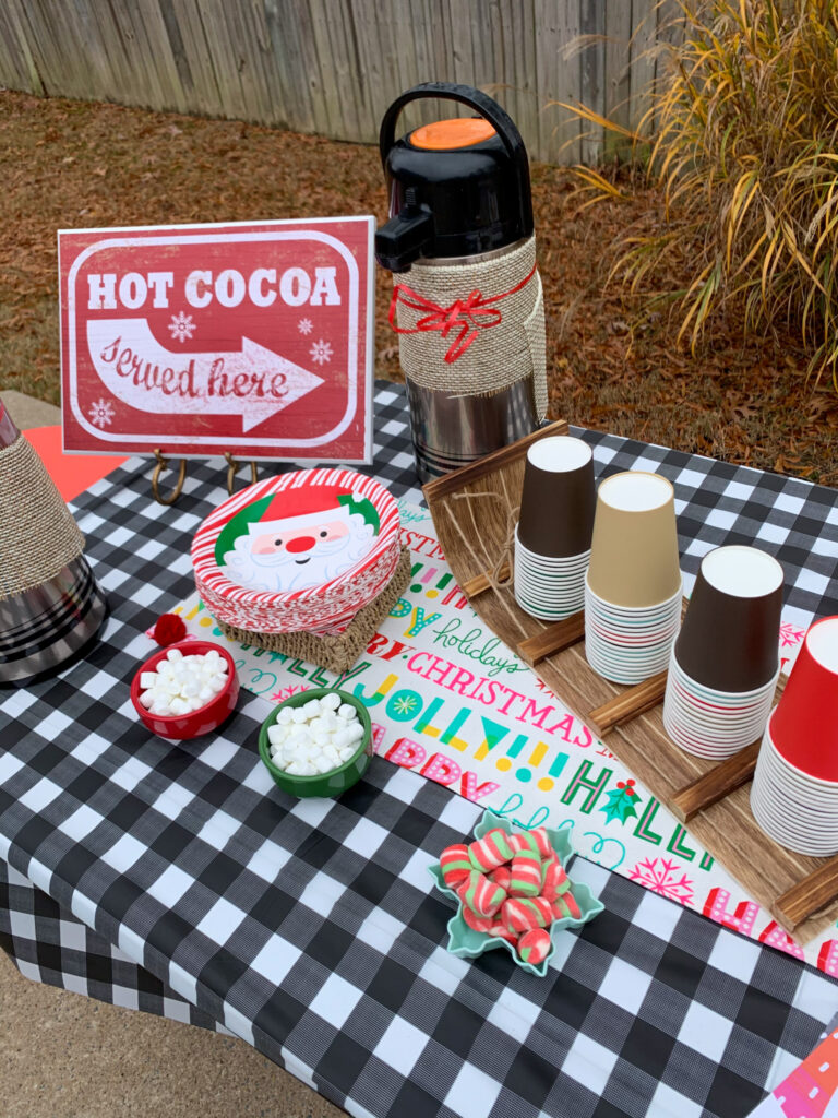 hot cocoa station at a neighborhood Cookies with Santa event