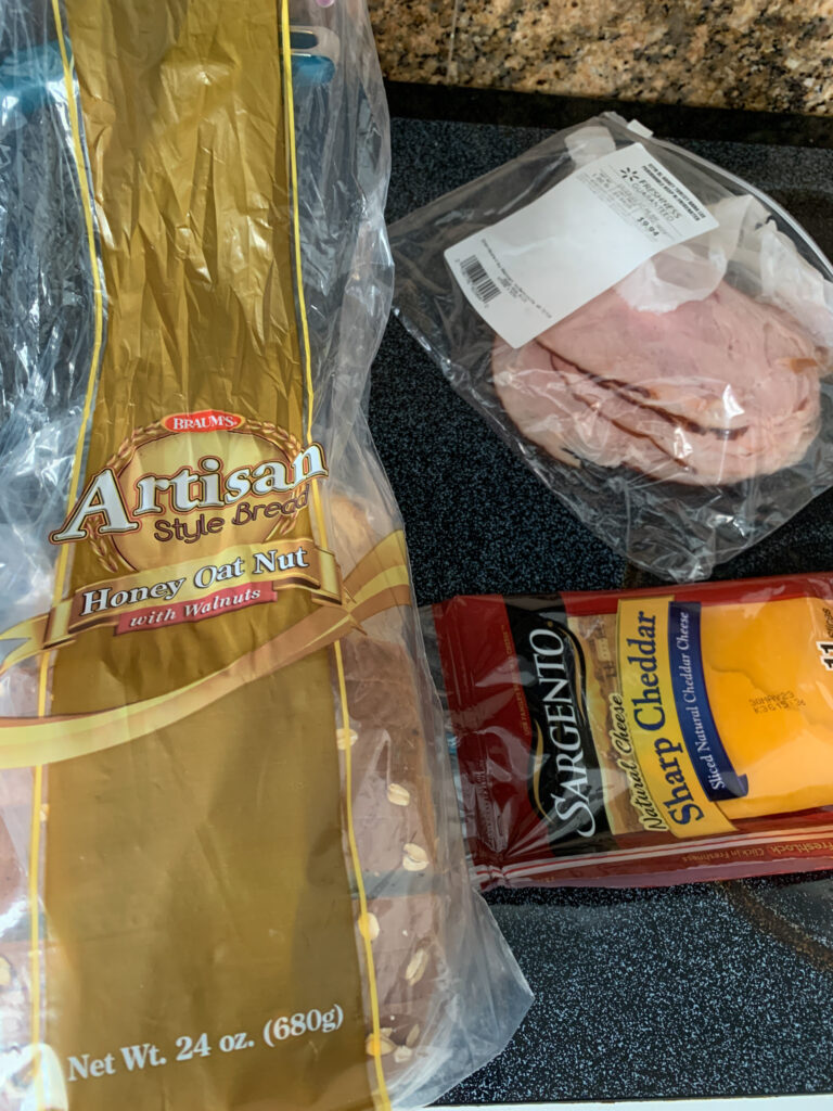 Braum's bread, turkey and cheese laid out for an air fryer turkey melt