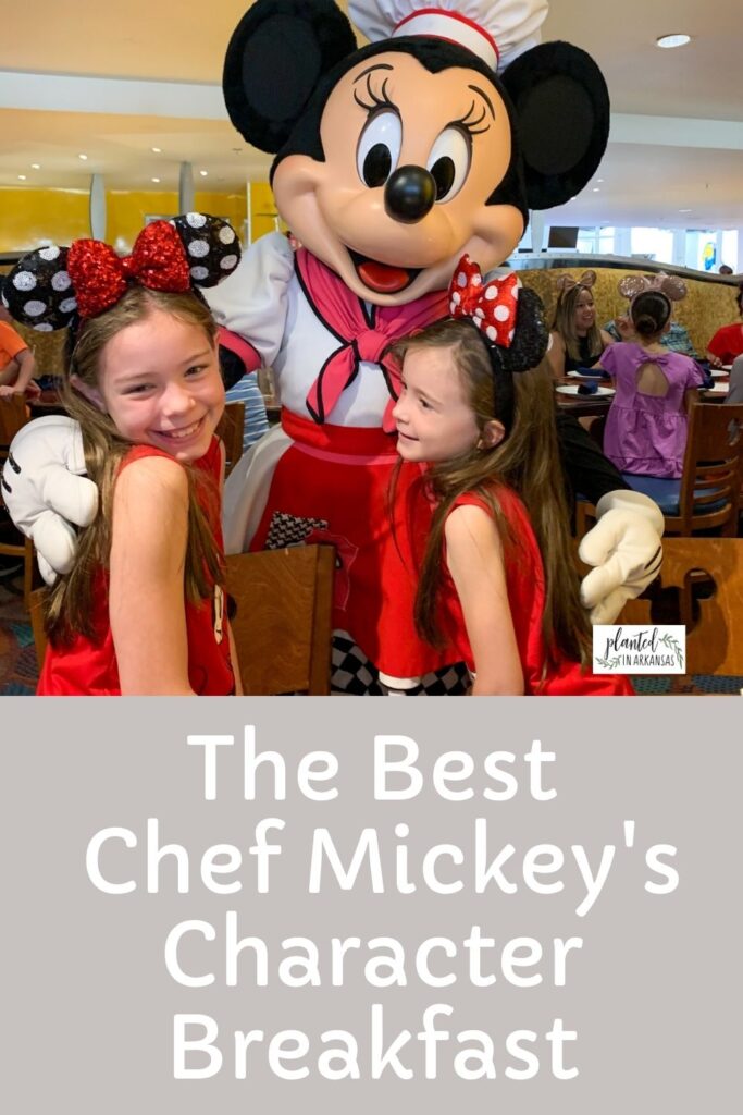 two girls hug Minnie Mouse at Chef Mickey's character breakfast