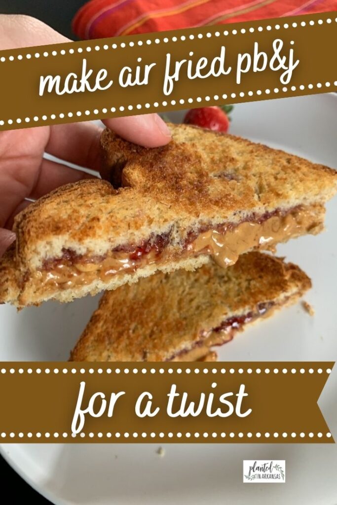 air fryer peanut butter and jelly sandwich on white plate with text overlay