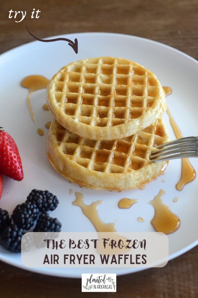 frozen Eggo Waffles air fryer baked on white plate with fruit and text