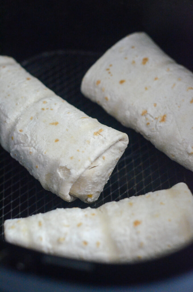 three frozen burritos in the air fryer 