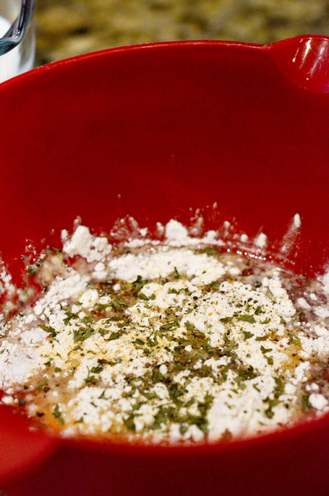 egg mixture in red bowl