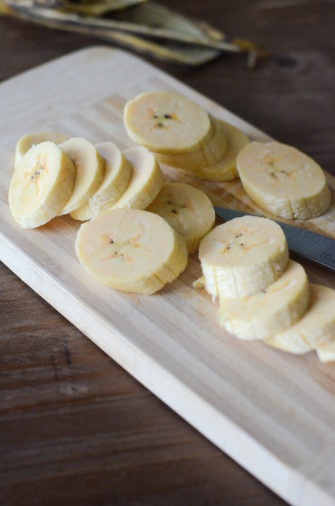 slices of sweet plantains on cutting board